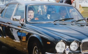 The Queen in one of her many cars