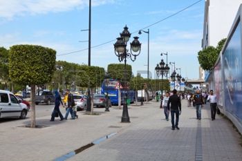 Avenue Bourghiba, the central thoroughfare of Tunis. Note the carefully clipped trees